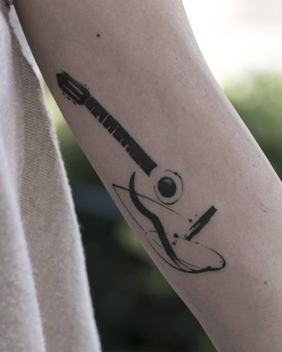 Small guitar tattoo | Music tattoos, Simple tattoos, Guitar tattoo design